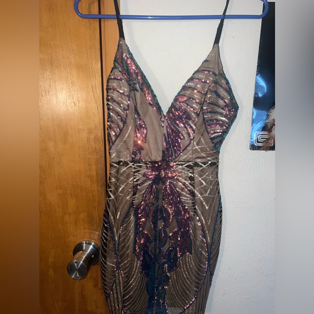 A peach sequin dress size small